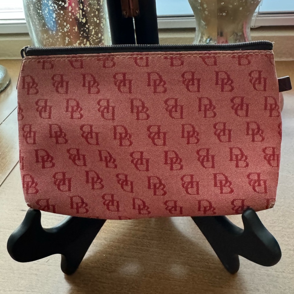 Dooney & Bourke Makeup Bag/Pouch in the Red Signature Fabric Print
